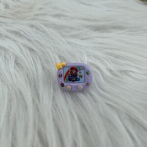 Bijou en résine pour chaussure écran Mario