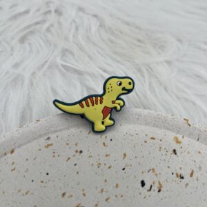 Bijou en silicone pour chaussure dinosaure jaune