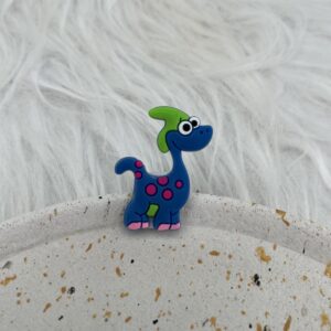 Bijou en silicone pour chaussure dinosaure bleu à taches