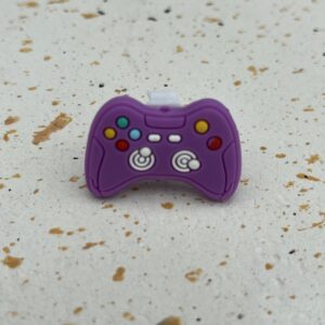 Bijou en silicone pour chaussure manette mauve