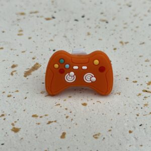 Bijou en silicone pour chaussure manette orange